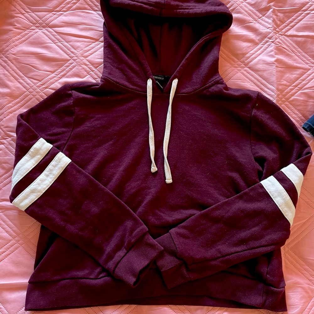 Never worn. Forever 21 maroon cropped hoodie. Women’s size medium